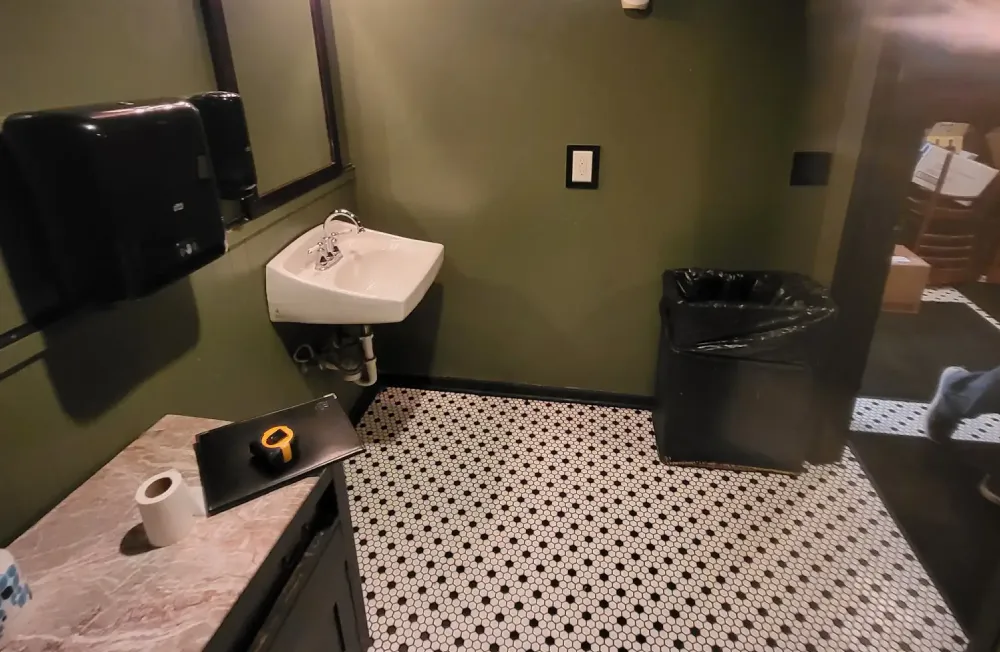 Bathroom renovation with modern fixtures and tile